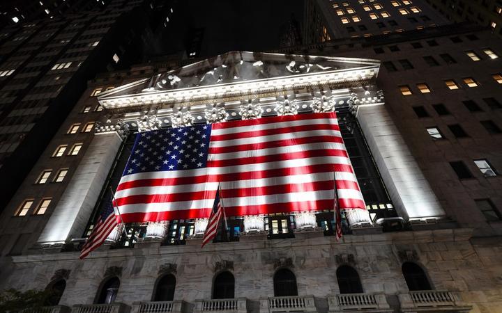 A view of the New York Stock Exchange in Wall Street with US national flag on Election Day.