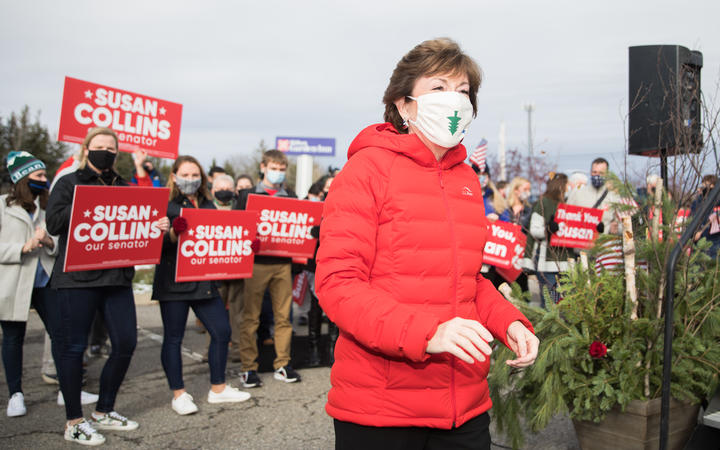 Senator Susan Collins makes her way back to her campaign bus after announcing her competitor Sara Gideon called to concede on November 4, 2020 in Bangor, Maine. 