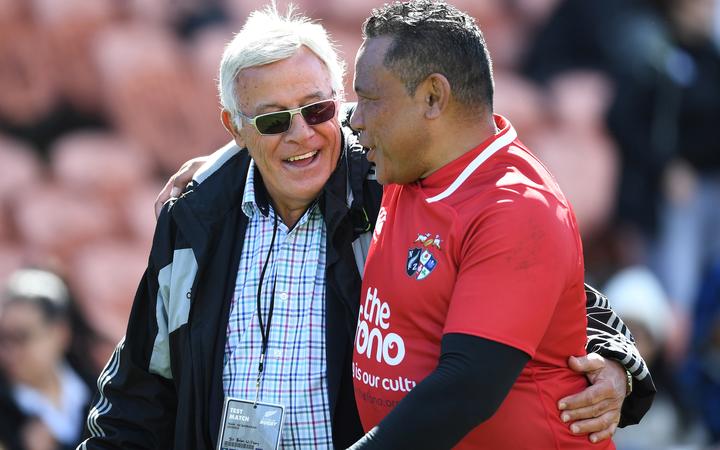 Former All Blacks Sir Bryan Williams and Ofisa Tonu'u catch up after the New Zealand Barbarians Legends v Pacific Legends game in 2019.