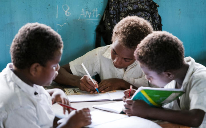 Grade three students hard at work during an English lesson at Nguvia Primary School near Honiara, Solomon Islands.