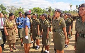 Colonel Litea Seruiratu (fourth from left) reviews detachment of female cadets at Xavier College in Ba.