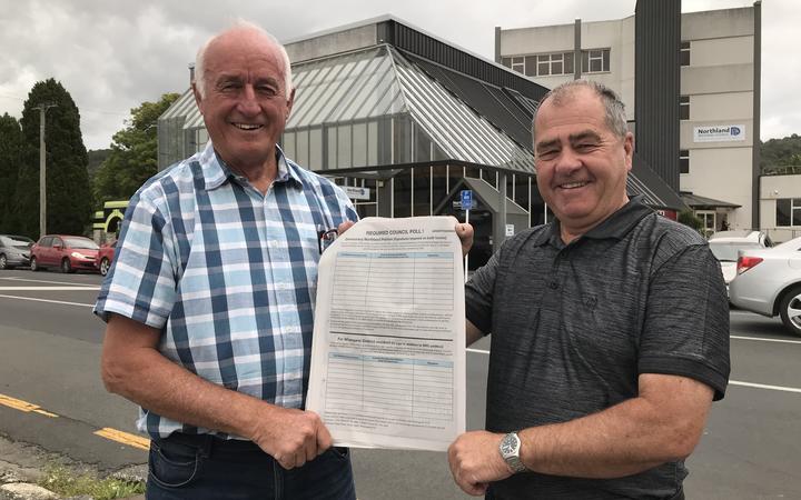 Democracy Northland campaigners John Bain (left) and Robin Grieve (right) are spearheading New Zealand's biggest Māori wards opposition polling demand campaign outside Northland Regional Council's head office in Whangārei.