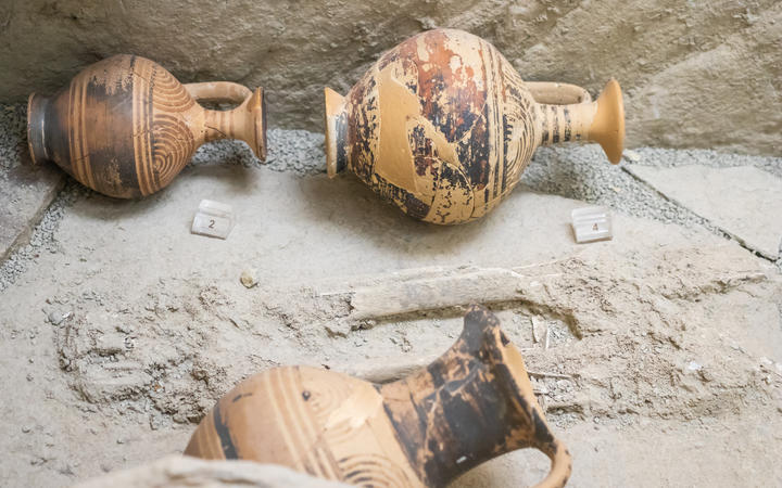 Small ancient greek lekythos decorated with groups of concentric
