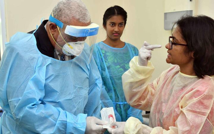 Fiji PM Frank Bainimarama visited the Covid-19 testing facility in Suva when it opened in April.