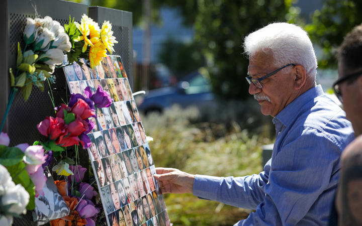 CTV Families Group spokesperson Maan Alkaisi paying tribute to victims at the former site of the building on 16 December, 2020.