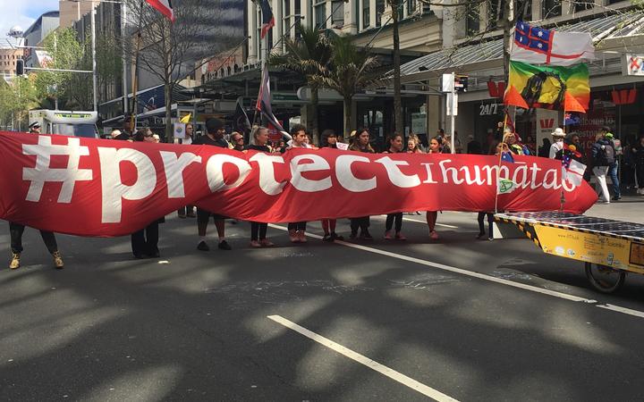 Marchers protest about ihumatao at the climate change march on Auckland's Queen St on 27 September 2019.