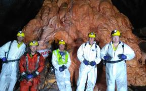 Geotechnical engineer Rick Lee, mine worker Luke Taylor, chief operating officer Dinghy Pattinson, mine manager / health and safety manager Greg Duncan, and mine maintenance planner Liam Collins at the Rocsil Plug.