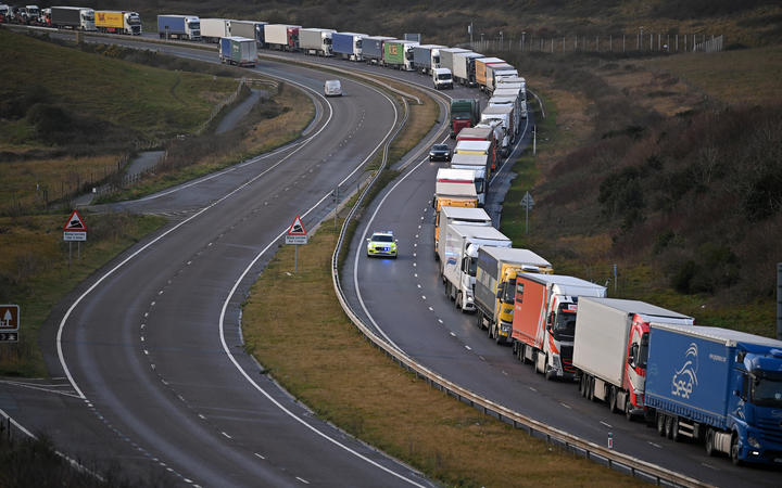 The Dover Traffic Access Protocol (TAP) scheme on the A20 is seen in action as freight lorries queue on the main route into the port of Dover on the south coast of England on December 17, 2020.