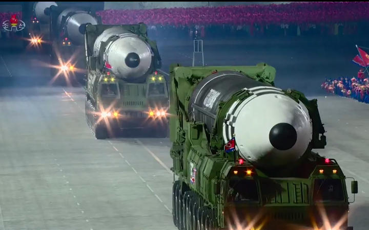 A screen grab taken from a KCNA broadcast on October 10, 2020 shows what appears to be new North Korean intercontinental ballistic missiles during a military parade on Kim Il Sung square in Pyongyang.