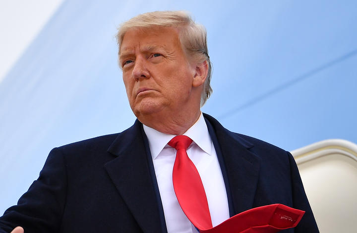 US President Donald Trump boards Air Force One before departing Harlingen, Texas on January 12, 2021. (Photo by MANDEL NGAN / AFP)