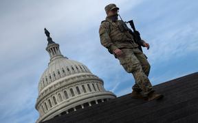 A member of the National Guard provides security at the US Capitol on January 14, 2021, in Washington, DC, a week after supporters of US President Donald Trump attacked the Capitol, and ahead of the inauguration of President-elect Joe Biden on January 20. 