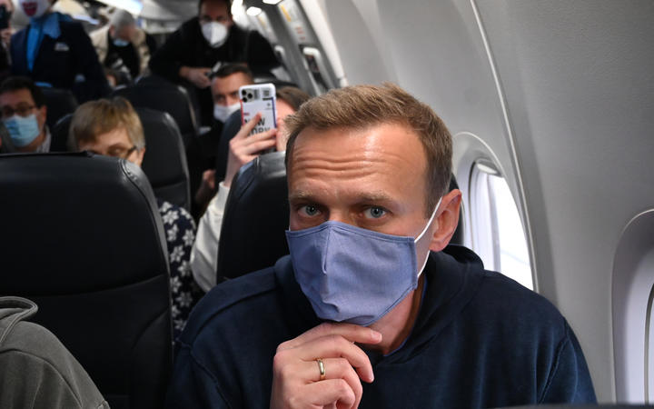 Russian opposition leader Alexei Navalny in a plane before takeoff from Germany bound for Moscow.
