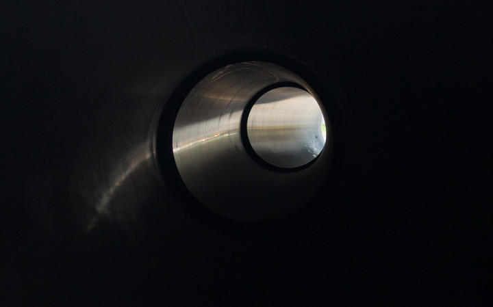 black background light inside the pipe, reconstruction of the water supply network, a polyethylene pipe for water supply is ready for installation