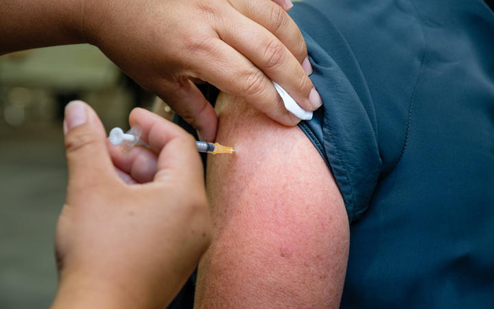 A worker on the frontline of Auckland's Jet Park Hotel quarantine facility being vaccinated against Covid-19 on 20 February 2021.