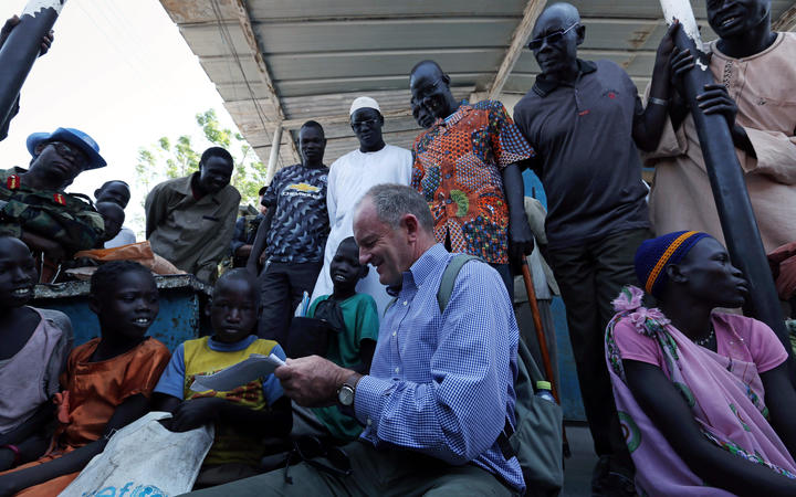 David Shearer with children in Koch