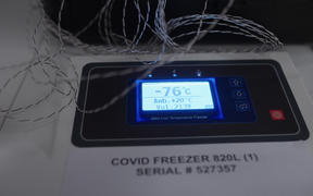 Temperature display on a freezer which will be used to store Pfizer-BioNTech Covid-19 vaccine vials.
