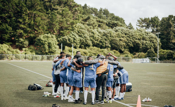 Wellington Lautoka FC huddle up ahead of their first group match in the 2021 Wellington B.O.G. tournament. March 2021