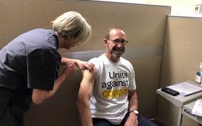 Health Minister Andrew Little receives a Covid-19 vaccine, Wellington, 7 April 2021.