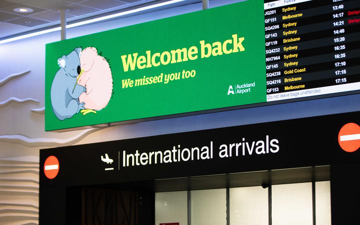 Auckland Airport welcome back sign.