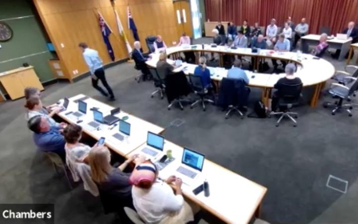 Councillor Adie Doyle leaves the Ruapehu District Council chamber for the duration of the karakia.  Photo taken from Ruapehu District Council livestream.