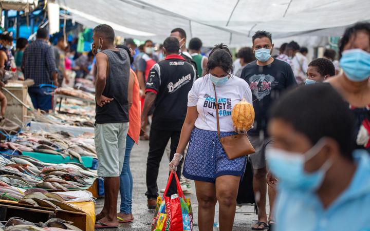 This photo from April shows shoppers in Suva's fish market preparing for a lockdown in late April. 