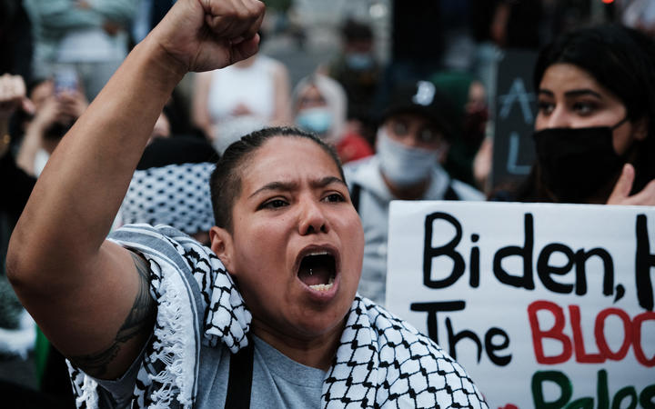 Thousands of protesters and activists shut down a street as they voice anger at Israel and support of Palestinians in New York City. 