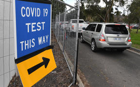People queue in their cars at a Covid-19 testing station in Melbourne on May 25, 2021, as the city recorded five new locally-acquired coronavirus cases in the community after an 85-day unbroken stretch of zero infections. 