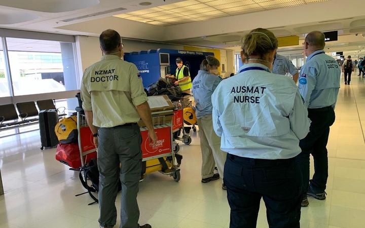 Members of the AUSMAT team arrive in Fiji.