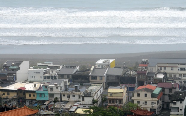 Waves hit the shore line near the Wushih harbour in Yilan as typhoon Goni approaches eastern Taiwan last year.