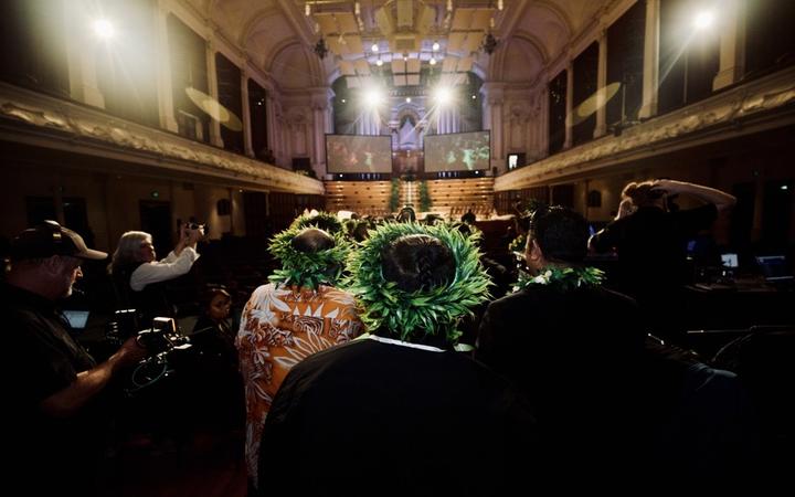 The Cook Islands community enter Town Hall. 