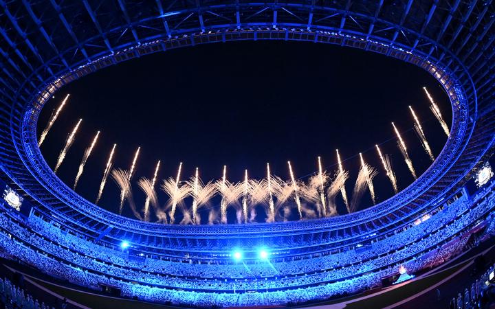 Fireworks go off around the Olympic Stadium during the closing ceremony of the Tokyo 2020 Olympic Games, in Tokyo.