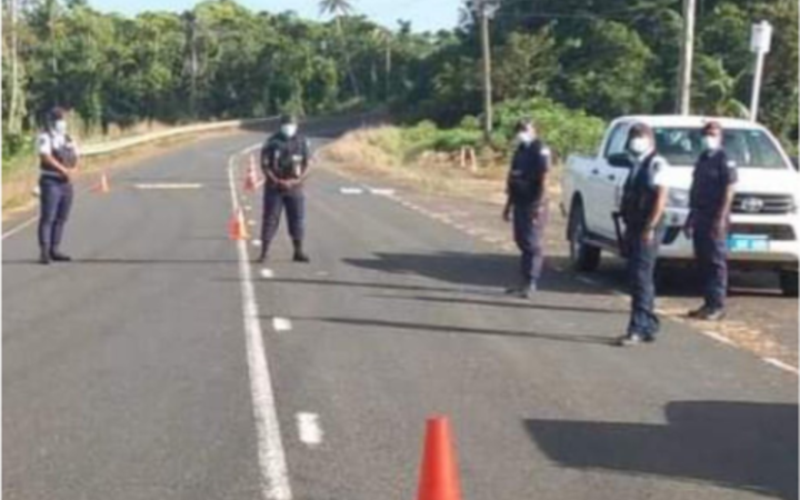 Police at a checkpoint near Nabouwalu.