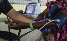 Papua New Guinea (July 7, 2015) Hospitalman Jaime Cavalleroserna, from San Francisco, takes patient vitals during a community health engagement. Medical personnel from the hospital ship USNS Mercy (T-AH 19) arrived in Kokopo  during Pacific Partnership 2015.