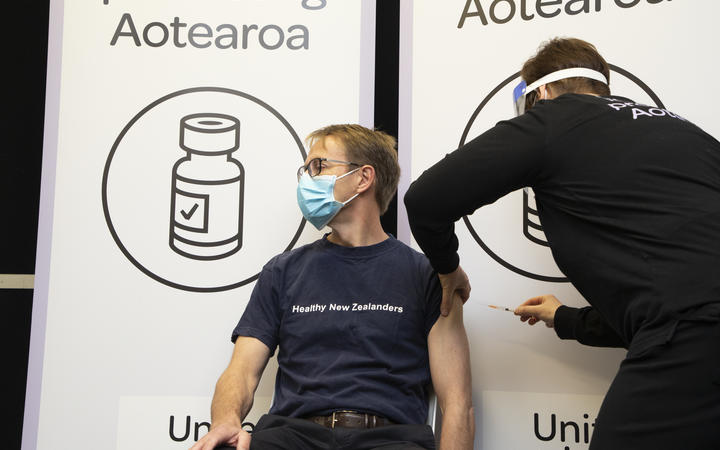 New Zealand Director-General of health Dr Ashley Bloomfield receiving his first dose of the Covid-19 vaccine.