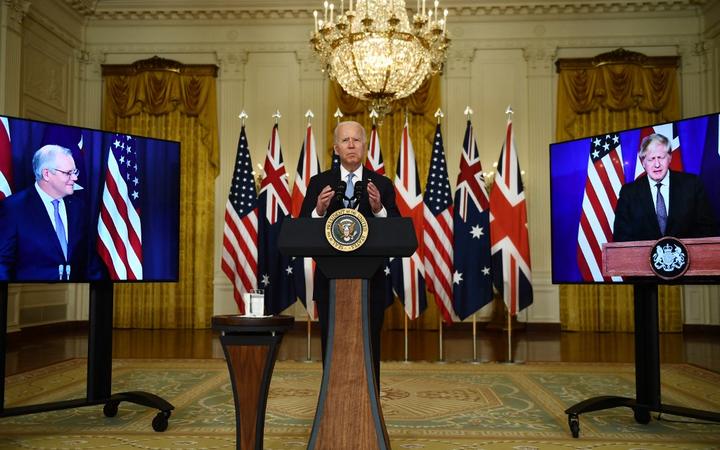 US President Joe Biden participates is a virtual press conference on national security with British Prime Minister Boris Johnson (R) and Australian Prime Minister Scott Morrison in the East Room of the White House in Washington, DC, on September 15, 2021.