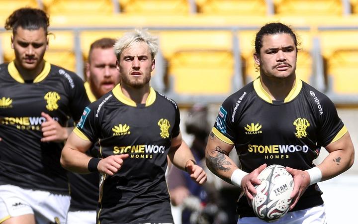 Lions captain Du'Plessis Kirifi leads his team to the field during the NPC rugby match between the Wellington Lions and Hawkes Bay at Sky Stadium in Wellington. 26 September 2021. Â© Copyright image by Marty Melville / www.photosport.nz