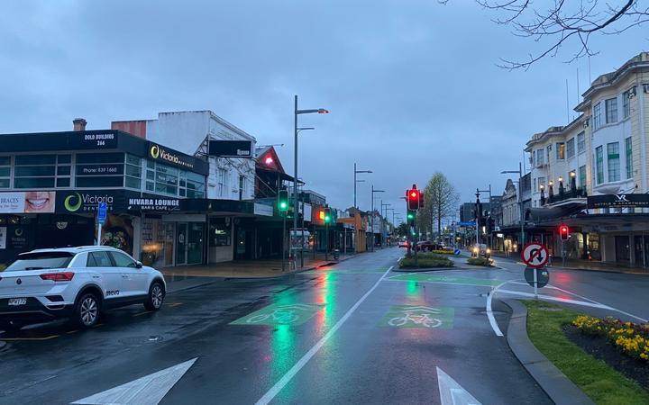 A quiet Hamilton street on Monday as part of the Waikato region starts five days of alert level 3 following two community cases of Covid-19.