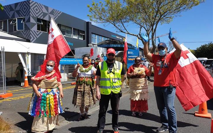 Langimalie Supervax Event in Onehunga, Auckland run by the Tongan Health Society. The society's CEO Dr Glenn Doherty (middle) says they're giving 100 doses per hour.