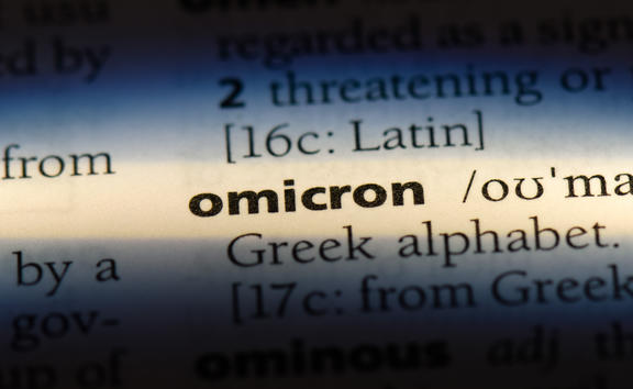 omicron word in a dictionary. omicron concept.