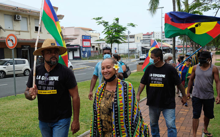 Independentists demonstrate as they hold Kanak flags the morning after the self determination referendum in Noumea, in the French South Pacific territory of New Caledonia