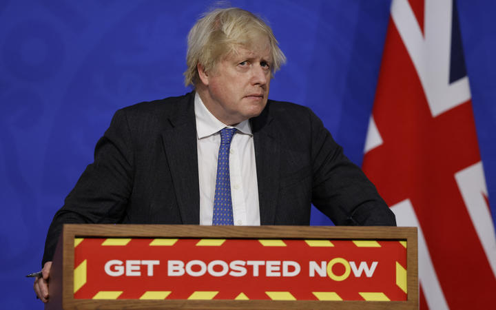 Britain's Prime Minister Boris Johnson attends a press conference to update the nation on the Covid-19 booster vaccine programme.