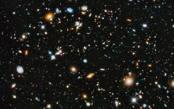 This Hubble image captures galaxies as far back as 400 million years after the Big Bang. James Webb will go back even further in time.