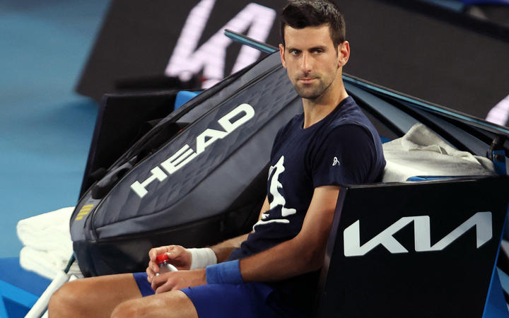 Novak Djokovic attends a practice session on 14 January 2022 ahead of the Australian Open tennis tournament in Melbourne.