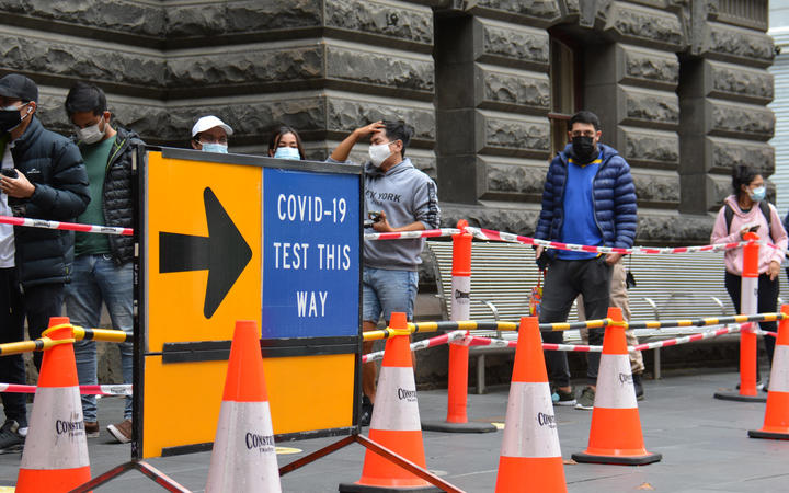 People queue for a Covid-19 PCR test in Melbourne, Australia on 8 January, 2022. 