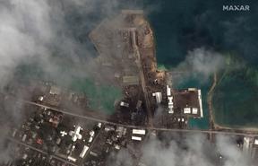 Volcanic ash covering the main port facilities in Nuku'alofa, the capital of Tonga, on 18 January, 2022. 