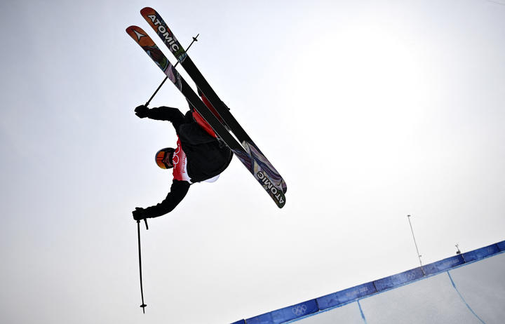 New Zealand's Nico Porteous practices before the start of the freestyle skiing men's freeski halfpipe qualification run during the Beijing 2022 Winter Olympic Games on February 17, 2022. 