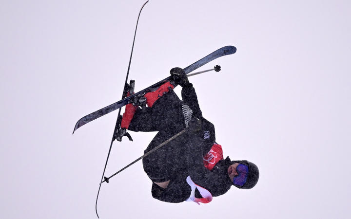 New Zealand's Miguel Porteous competes in the freestyle skiing men's freeski halfpipe qualification run during the Beijing 2022 Winter Olympic Games on February 17, 2022. 