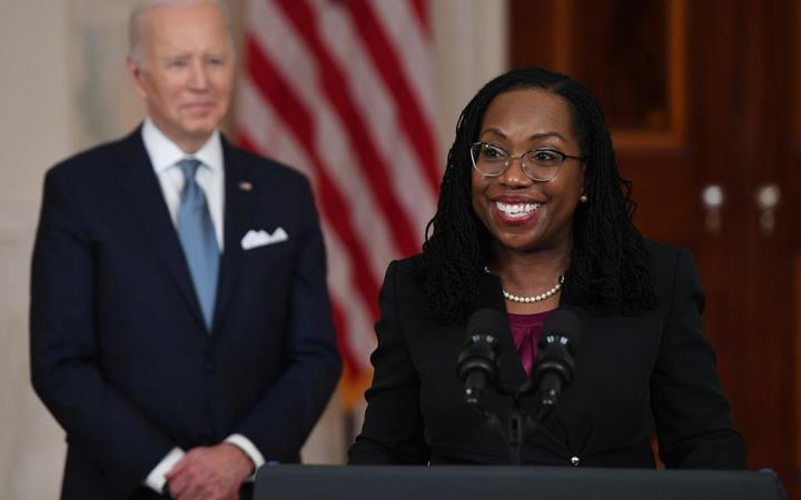 Judge Ketanji Brown Jackson, with President Joe Biden, speaks after she was nominated for Associate Justice of the US Supreme Court, in the Cross Hall of the White House in Washington, DC, February 25, 2022.