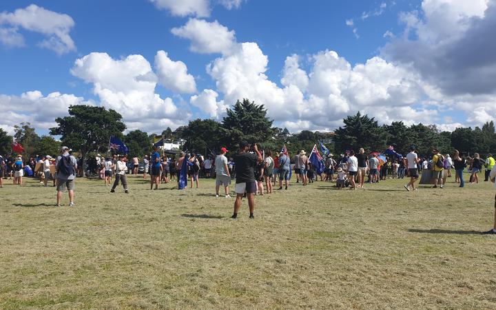 Anti-mandate protesters gather at Onepoto Domain on the North shore as they prepare to march across the Auckland Harbour Bridge.