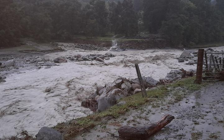 A flooded river in the Te Puia Springs valley, Gisborne area, March 23, 2022